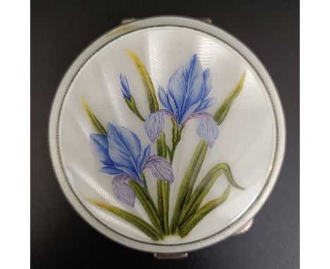 A silver and enamel compact, decorated iris, Birmingham 1956, 7.5 cm diameter