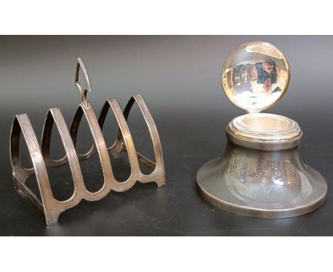 A silver toast rack, and a silver inkwell (2)