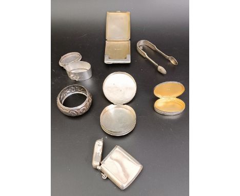 A silver vesta, and other small items