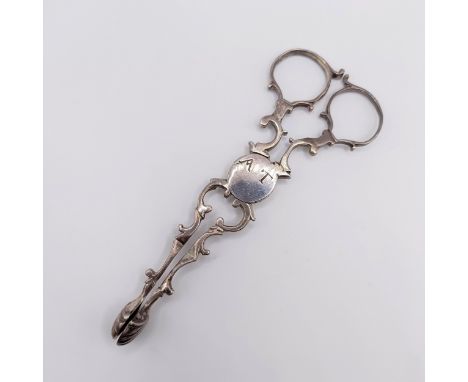 A pair of Georgian silver sugar tongs, initialled, 1.2 ozt