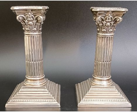 A pair of silver Corinthian column candlesticks, Sheffield 1898, 15.5 cm highLoaded