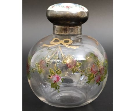 A silver topped scent bottle, with enamel decoration to the top and glass, Birmingham 1939, 10 cm high
