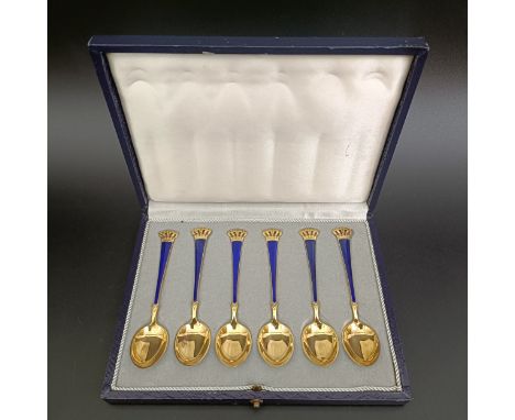 A set of six Danish silver gilt and blue enamel teaspoons, cased