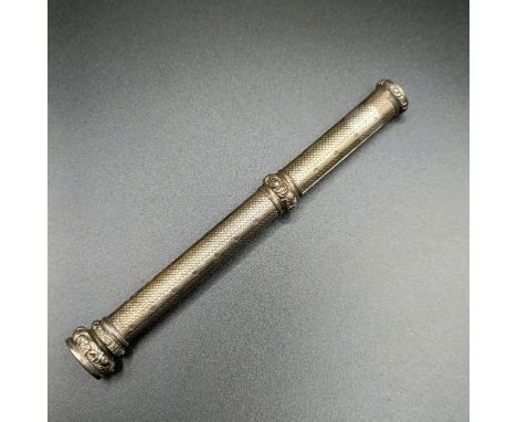 A Victorian silver pencil, London 1873, with a hardstone finial