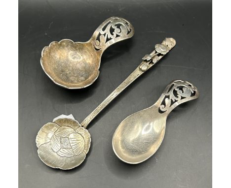 A silver caddy spoon, another, and a sterling silver spoon, 57 g (3)