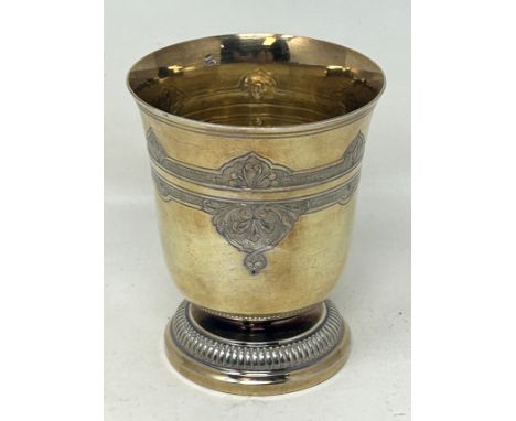 A French silver gilt beaker, with engraved decoration, 3.4 ozt, 8.5 cm high
