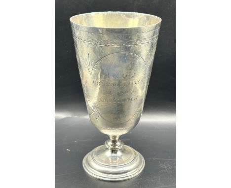 A Victorian silver goblet, with engraved decoration, inscribed, London 1875, 5.0 ozt, 13.5 cm high