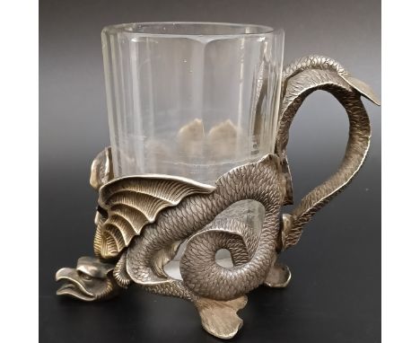 A 19th century Russian silver tea glass, in the form of a dragon, with a glass liner, 12.9 ozt, 11 cm high