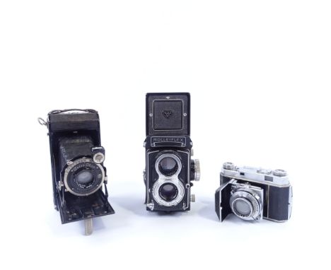 Rolleiflex Twin Lens Reflex camera, a Kodak Retina II roll film camera, and a Zeiss Ikonta folding camera (3)All in good but 
