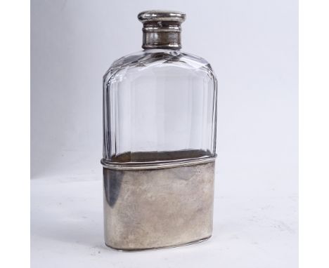 A Victorian silver mounted hip flask, hallmarked Birmingham 1881 maker J.L., height 14cm.Good condition. Glass very clear, si