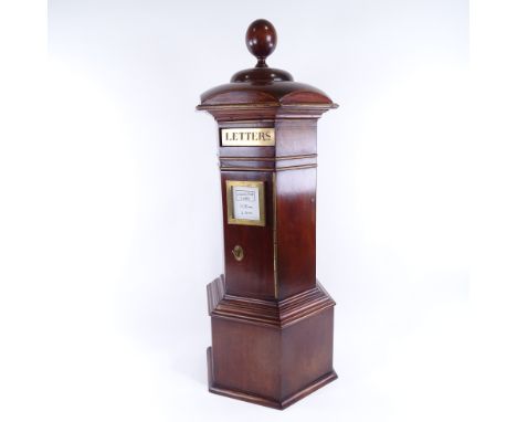 A vintage mahogany country-house post box, with applied mouldings, brass mounts and ball finial, height 70cm, probably early 