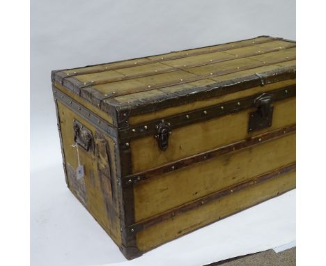 MOYNAT PARIS - Vintage metal and wood-bound canvas-covered travelling trunk, original paper label inside lid dated 1920, 100c