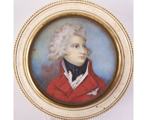 ROYAL INTEREST - an early 19th century circular ivory box, with inset painted portrait on ivory depicting George IV wearing a