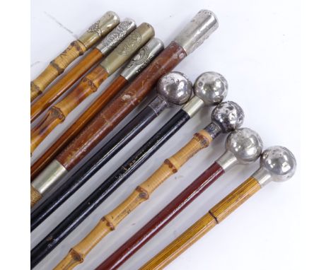 A bundle of silver and nickel-topped military swagger sticks, including RFC(10)The ball-topped bamboo stick is very dented, t