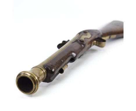 A 19th century flintlock brass-barrelled blunderbuss, with mahogany stock, impressed marks to the barrel, barrel length 35cm,