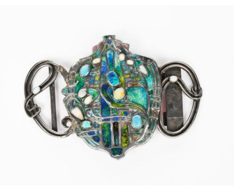 A large silver and enamel belt-buckle probably Scottish, sinuous, wirework frame with blue and green enamel panels, set with 