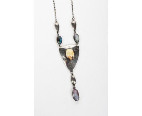 An early silver and gem set pendant necklace attributed to Arthur Gaskin, silver shield shaped pendant with fine chased heart