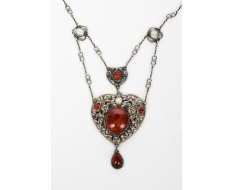 A silver necklace by Horace Minns probably made at the Artificers Guild,  the design attributed to Edward Spencer, raised hea