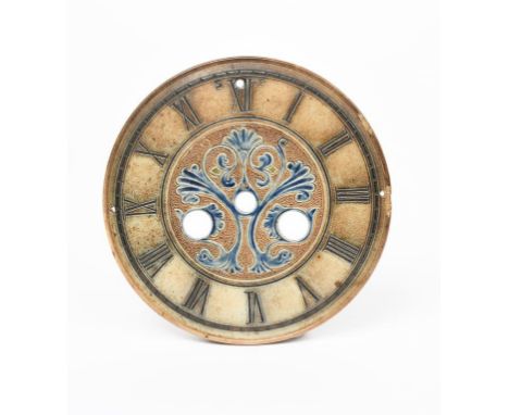 An early Martin Brothers stoneware clock face by Robert Wallace Martin, dated 1878, circular form, incised to the centre with