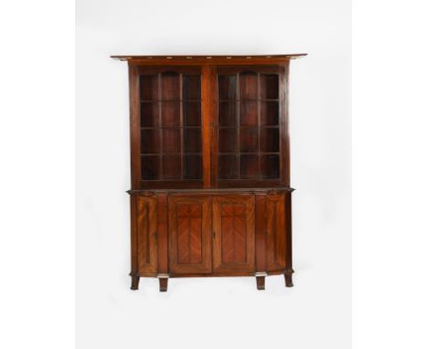 A Heal's mahogany cabinet designed by Ambrose Heal, made to celebrate his marriage and dated 1895, central two door cabinet f