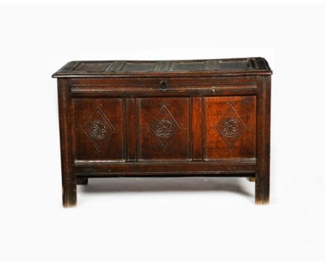 A 17th/18th century oak three panel coffer, with hinged top, carved with diamond shaped panel decoration, 110 c x 50.5cm, 71c