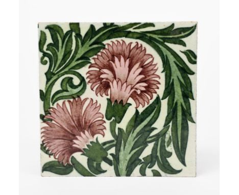 A William De Morgan Late Fulham Period tile, painted with carnations in shades of green and aubergine on a white ground, and 