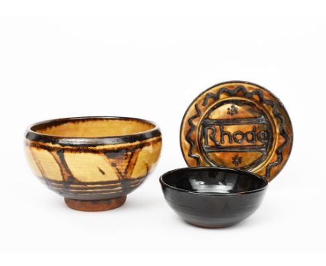 Michael Cardew (1901-1983)a Winchcombe Pottery footed bowl, slip decorated in brown and buff, a Winchcombe plate titled Rhoda