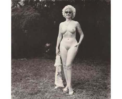 Artist: Diane Arbus (American, 1923-1971). Title: "Nudist Lady with Swan Sunglasses, PA". Medium: Original photogravure. Date