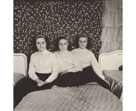 Artist: Diane Arbus (American, 1923-1971). Title: "Triplets in Their Bedroom, N.J". Medium: Original photogravure. Date: Comp