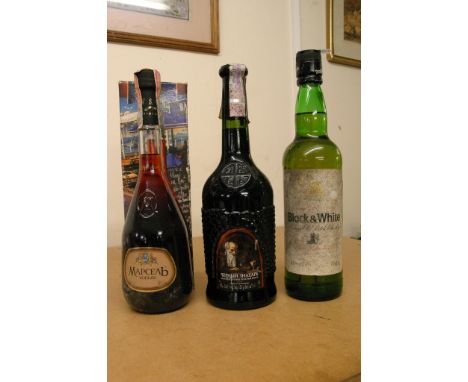 Three bottles of alcohol including a vintage bottle of Black and White Old Scotch Whisky