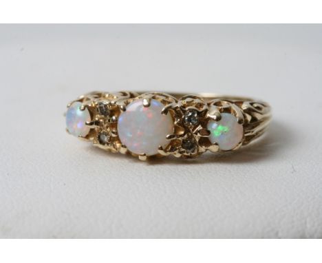 A 9ct gold opal and diamond ring 