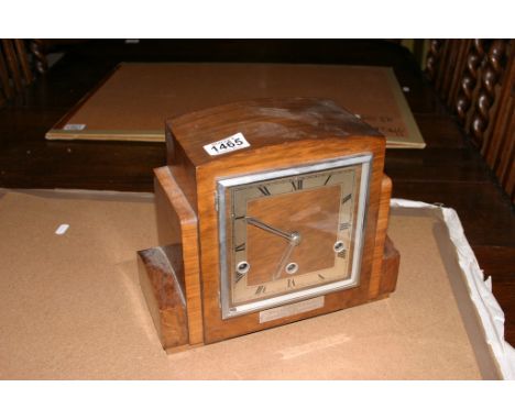 A walnut mantel clock of Art Deco design 