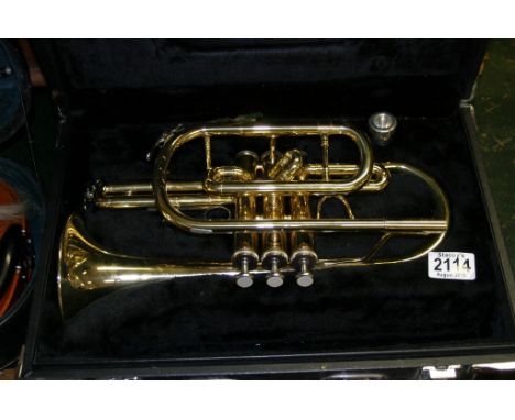 A cased cornet marked 'Jupiter' together with an unmarked violin and bow in carry case.