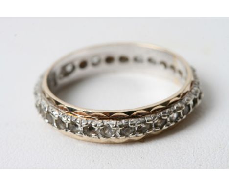 A 9ct gold eternity ring 