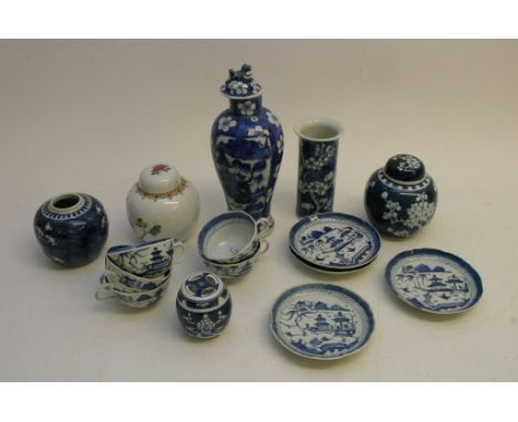 A collection of late 19th century Chinese export porcelain including cups, saucers and a  vase some with character marks to t