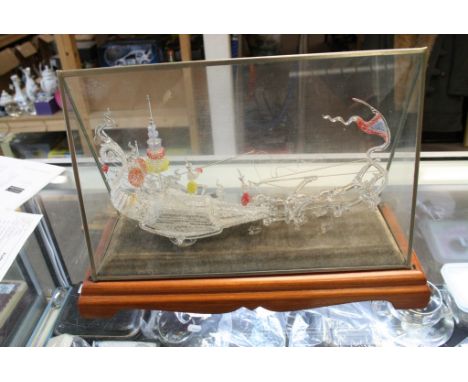 An unusual,intricate and highly detailed glass model of a Chinese sailing jug in a glass and wood case