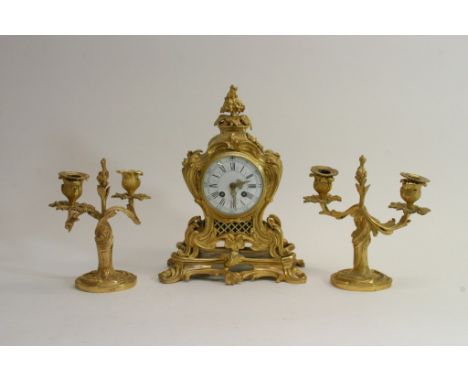 A quality Charles Hour, French ormulu clock garniture, in the Rococo style with enamel Roman numeral dial, key and pendulum, 