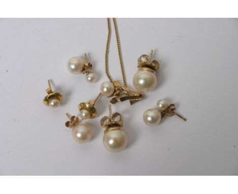 A 9ct gold pearl pendent with attached necklace and various pearl earrings 