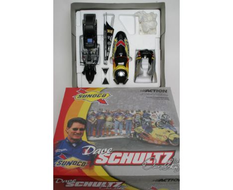 A Dave Schultz Action Bike in original box scale 1/9 complete and as new