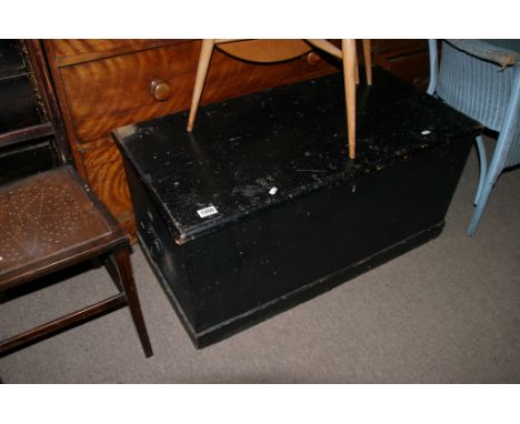 A black painted pine trunk 