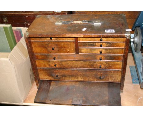 A wooden workman's box containing various engineering tools plus other cased sets and related books