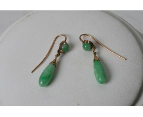 A pair of vintage gold and jade drop earrings 