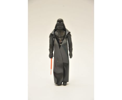 A 1978 Original Star Wars figure of Darth Vader with original light saber. The figure in original cloak. 