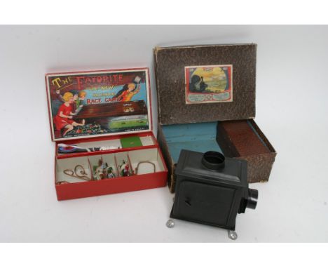 A box mechanical race game and a child's magic lantern