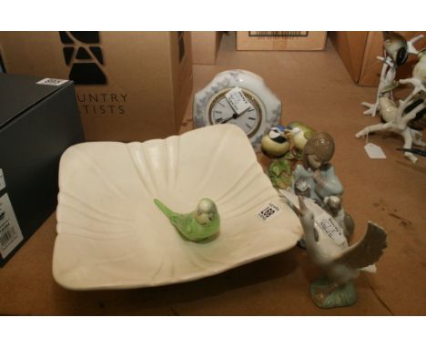 A collection of Lladro comprising a clock, figures, Ansley figures etc