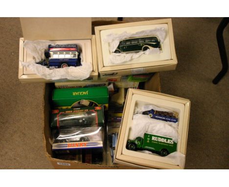 A collection of boxed model vehicles including Dinky, Corgi, models of Yesteryear, an original omnibus