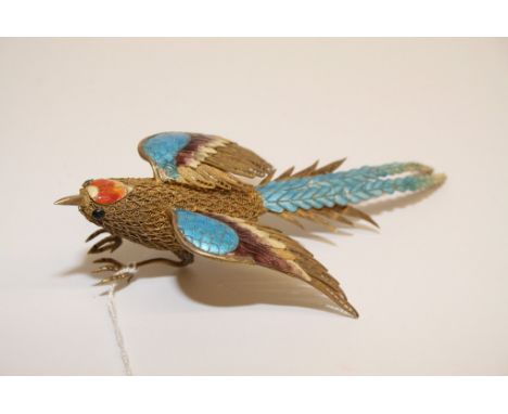 An interesting silver gilt and enamel filagree bird ornament, marked 925
