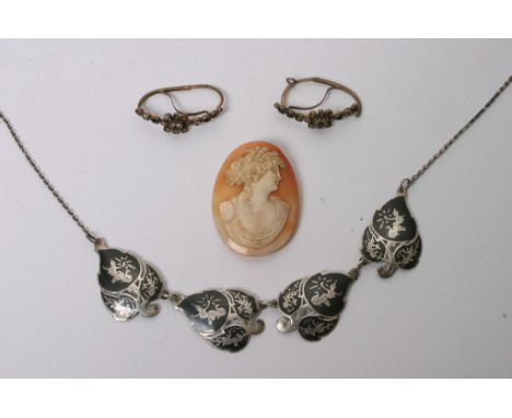 A fine antique portrait cameo (unmounted) a silver and niello bracelet decorated with dancing figures and flora and a pair of