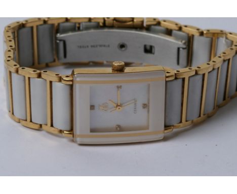 A modern ceramic and gilt metal lady's watch