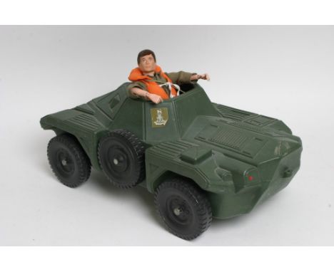 withdrawn action Man with flock hair in scout military car. 